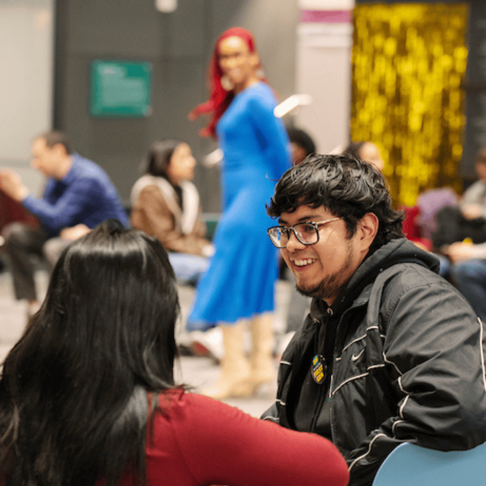 Students conversing at an event in Skidmore's Billie Tisch Center for Integrated Sciences