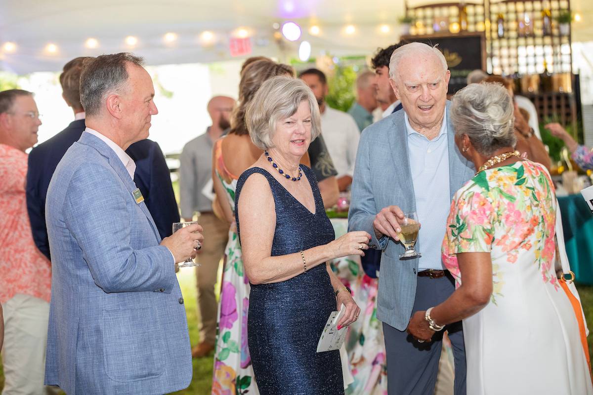 From left, Skidmore College President Marc C. Conner, Trustee Susan Dake ’71, Trustee Emeritus Bill Dake, and Trustee Emerita Linda Jackson-Chalmers ’73