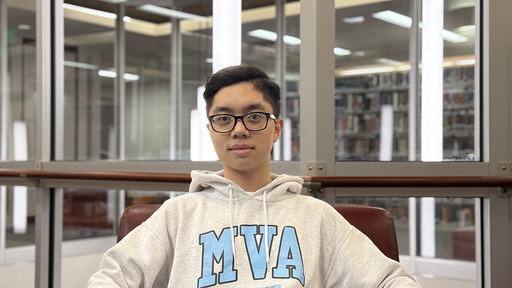 Quinn Tran ’27 in Scribner Library