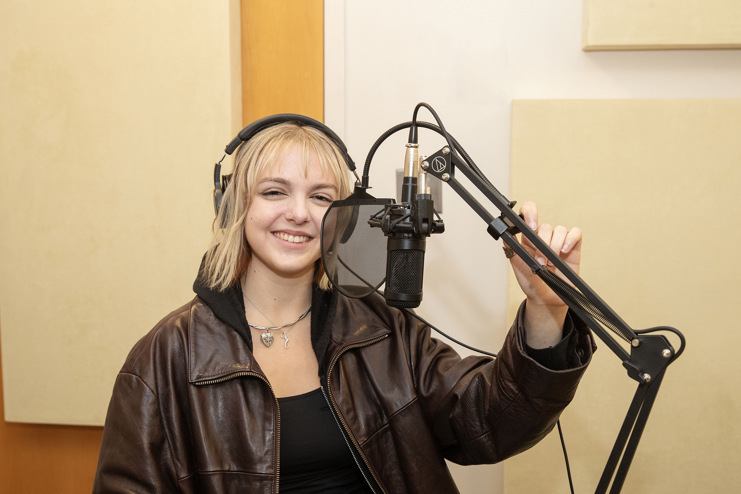 Grace Higginbotham '26 in the recording studio in Skidmore’s Learning Experience Design and Digital Scholarship Support (LEDS), where she works and has learned more about VR than she ever thought possible.