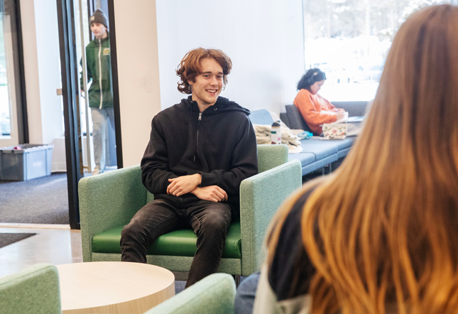 Vojta Kubala ’27 in the lobby of McCaffery-Wagman Tennis and Wellness Center