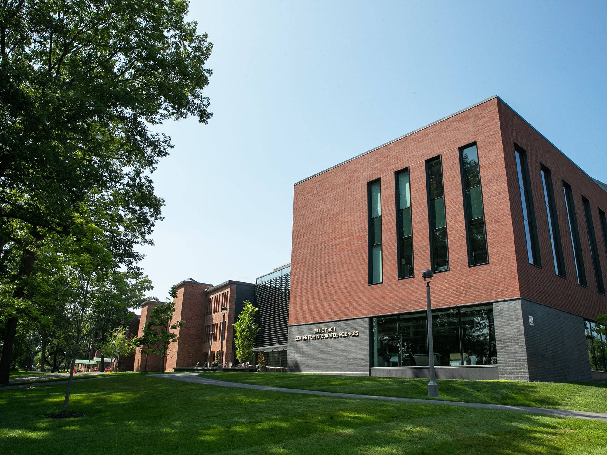 Exterior of the Billie Tisch Center for Integrated Sciences with a blue sky in the background