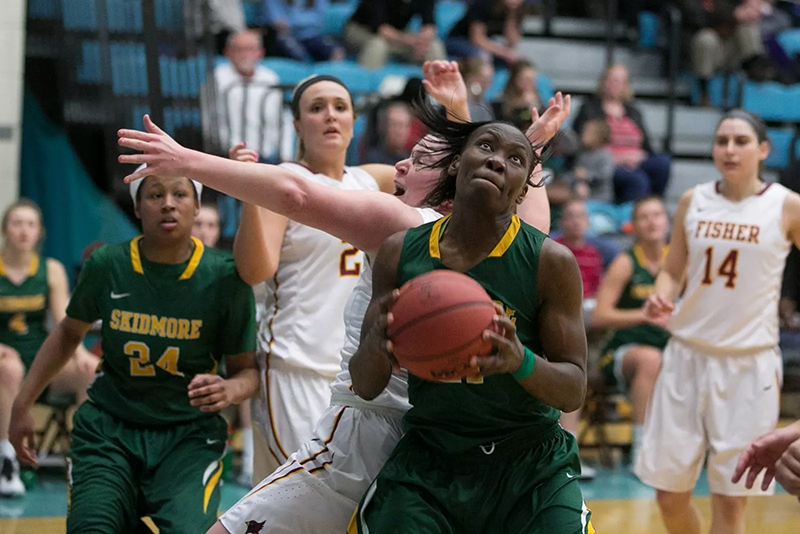 Angela Botiba '15 playing basketball
