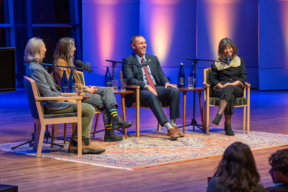 Assistant Professor of Art Samantha Haedrich, Professor of Psychology Casey Schofield, Jarod Koopman of the IRS, and author Geraldine Brooks on the stage of Zankel Music Center